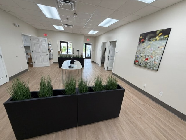 Commercial office lobby with LVP flooring and modern finishes